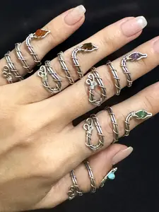 Wire wrapped snake raw crystal adjustable ring.