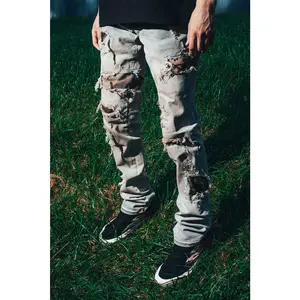 STACKED CAMO PATCH JEANS