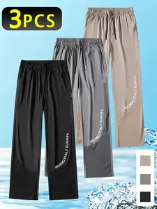 Men’s three-piece set featuring lightweight ice silk casual athletic pants—loose wide-leg drawstring joggers with a drawstring waistband; skin-friendly and comfortable, suitable for everyday wear. Jogging pants