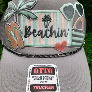 Summer,Beach themed trucker hats in a variety of designs.