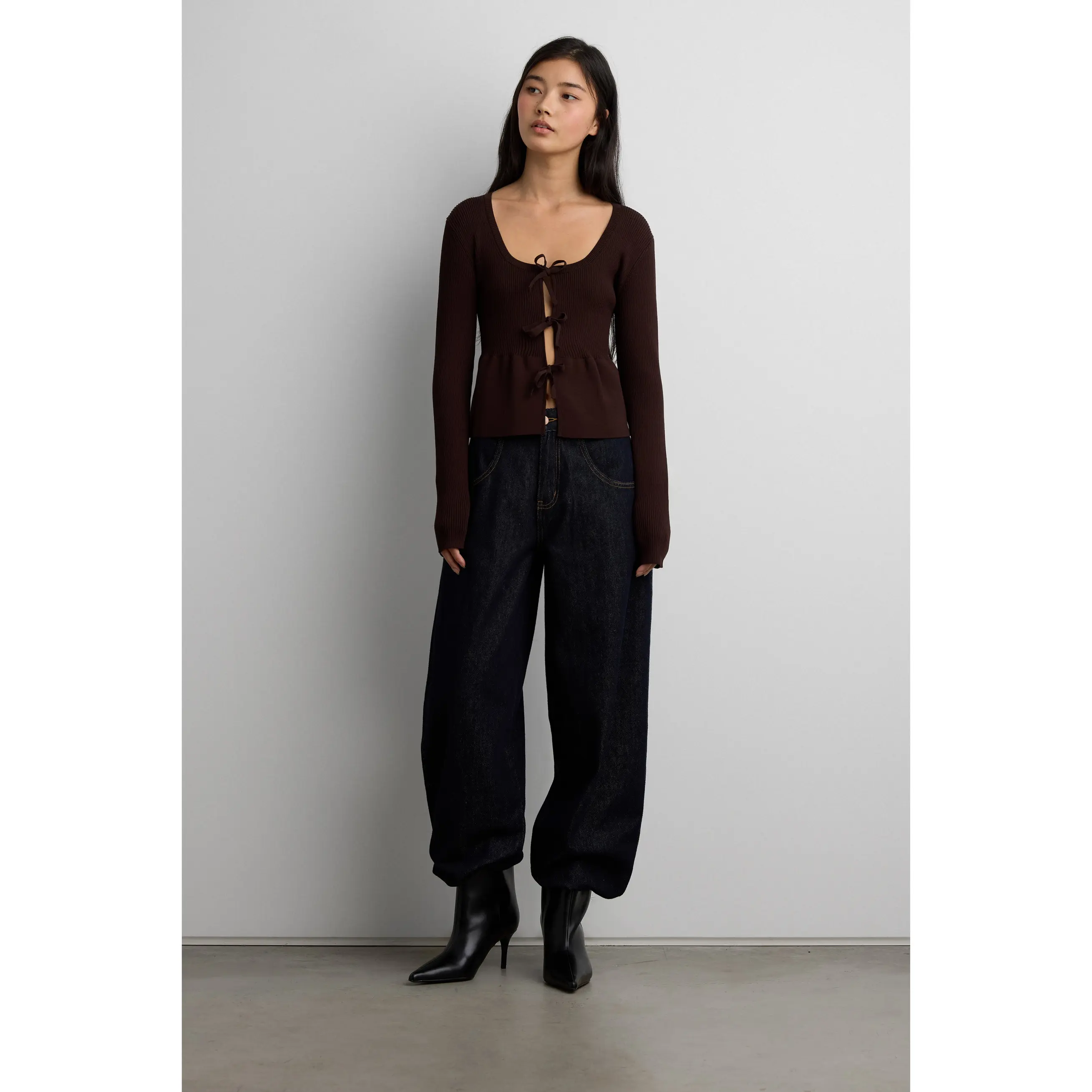 RIBBED TIE FRONT PEPLUM SWEATER