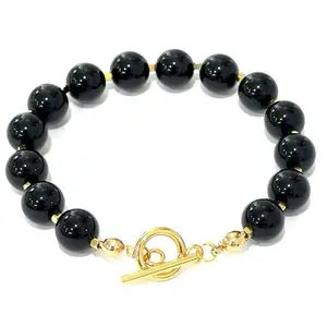 Natural Onix Brazalete Stainless Steel Bracelet with Black Beads and Gold Accents