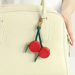 Cute Cherry-Shaped Mini Coin Purse with Airtag Charm Red Microfiber Synthetic Leather Green Lanyard Durable Compact Clutch for Women Perfect Gift Everyday Use Playful Design Keychain Accessory