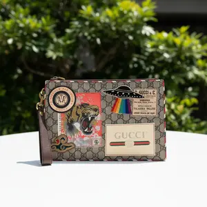 Pre-owned GUCCI Coated Canvas Clutches & Wristlets GG Supreme Monogram Courrier Embroidered UFO Pouch