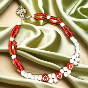 Red and White Beaded Bracelet with Heart Charm