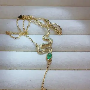 <PingEast Jewelry>Emerald necklace--925 Sterling Silver Gold-Tone Brushed Snake Necklace featuring a single 0.75ct pear-shaped natural strong-fluorescence Colombian emerald. Simple, elegant, and delicately refined — a timeless piece that pairs effortlessl