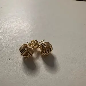 Nuditos Gold-Tone Spiral Stud Earrings for Women - Elegant and Stylish Jewelry Accessory