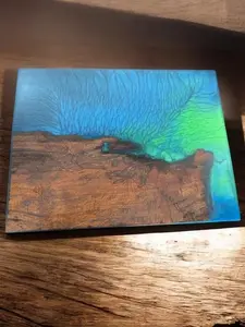 The Crafted Edge cutting board hand crafted with resin and live edge wood coastal colors serving board charcuterie