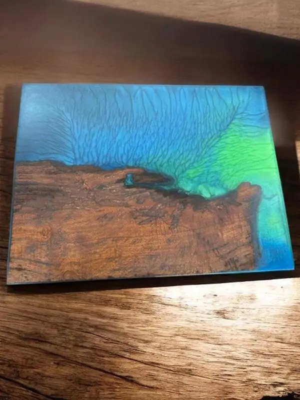 The Crafted Edge cutting board hand crafted with resin and live edge wood coastal colors serving board charcuterie