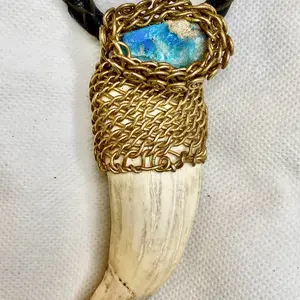Spirit of the Sacred Fang Pendant with intricate gold wire wrap and chrysocolla stone accents