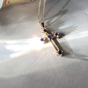 Artificial sapphire cross necklace