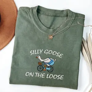 Silly Goose Riding Bike Shirt – Funny and unique T-shirt. Perfect gift for goose lovers or anyone who loves a laugh! Cotton Menswear