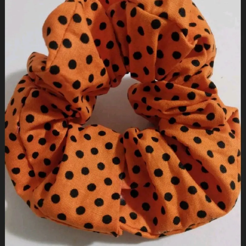 Orange polka dot scrunchie