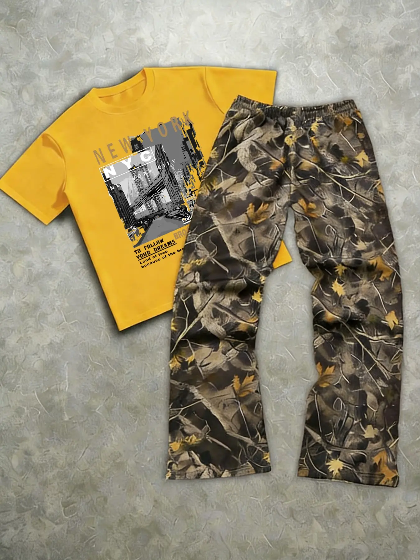 The men's two-piece set includes a short-sleeved T-shirt with a print of letters and street scenes and a pair of long pants; made of knitted fabric; suitable for everyday wear and all seasons. Casual Menswear Tee Clothes