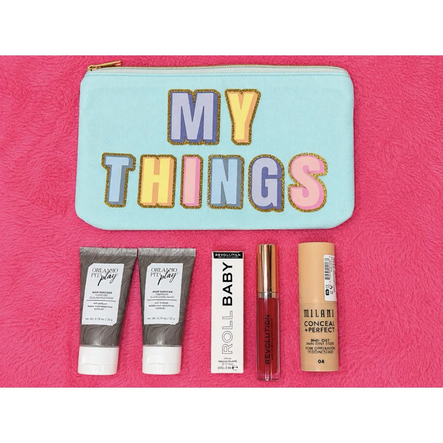 Revolution My Things Makeup Bag with Roll Baby Lipstick, Milani Conceal & Perfect Foundation, and My Play Products