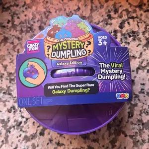 Crazy Fun RMS Galaxy, Purple Holographic & Stuffed Dumpling Squishy Toy, Durable Silicone Stress Relief Fidgeting Toy, Portable Tactile Unisex Classic Novelty Item