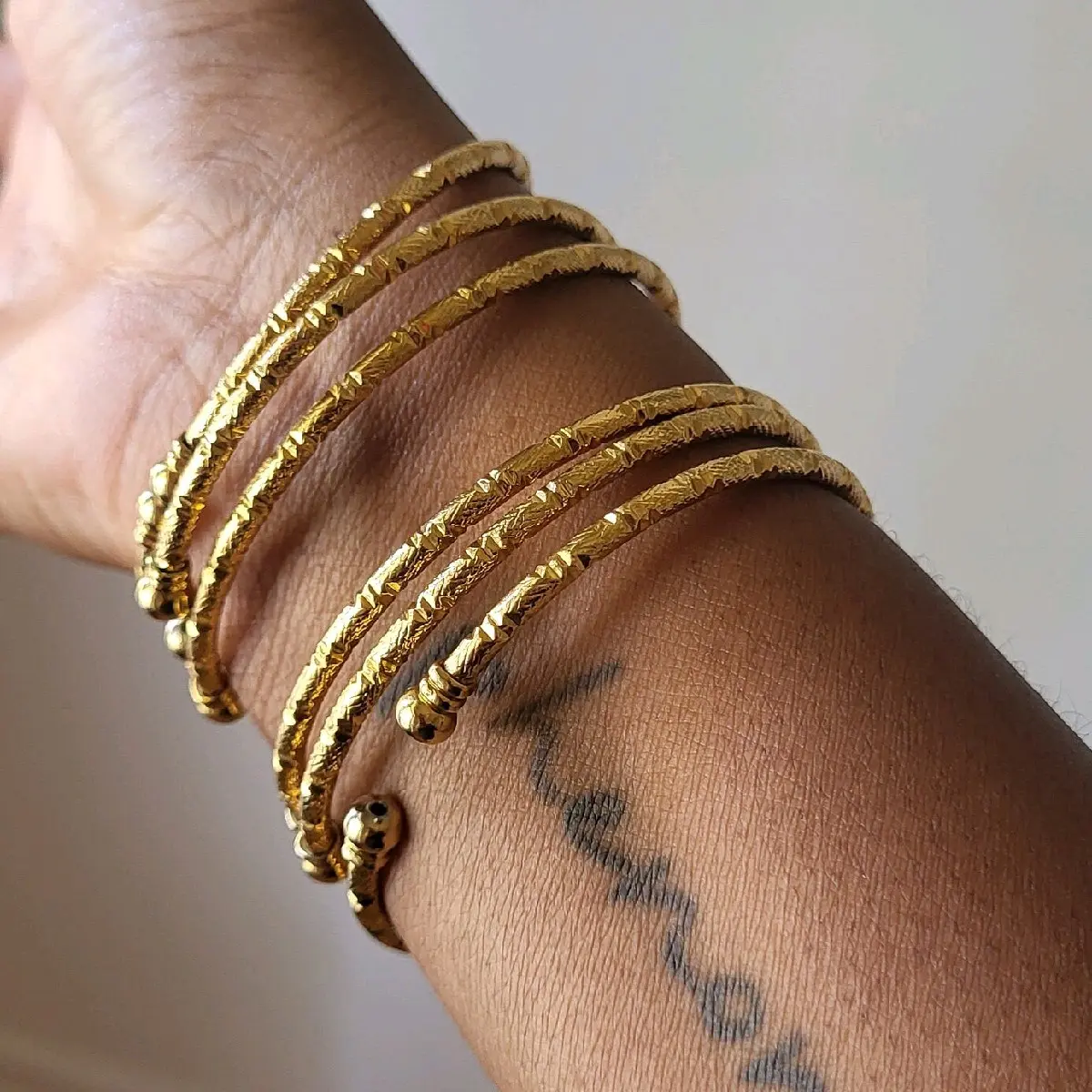 Goddess Brand 6 Piece Gold Plated Stainless Steel Stackable Bangles Set Exquisite Bracelet Faith Wear Jewelry Fashion Bracelets 18K Gold Plated Adjustable Cuffs 2MM Thickness Lightweight Comfortable Everyday Wear