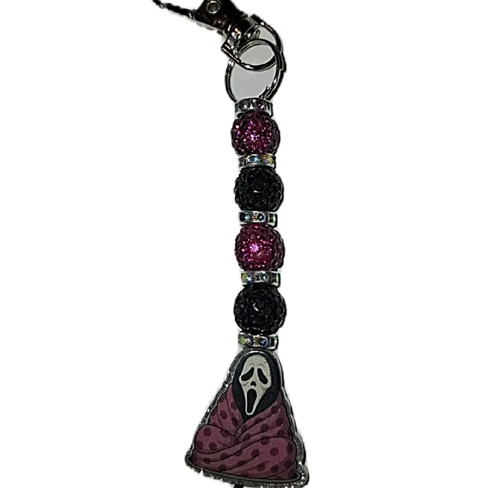Cozy Ghostface  - Cellphone Smartphone Charm - Bag Clip Keychain Accessory - Compact & Convenient - Versatile Use - Fun Accessory