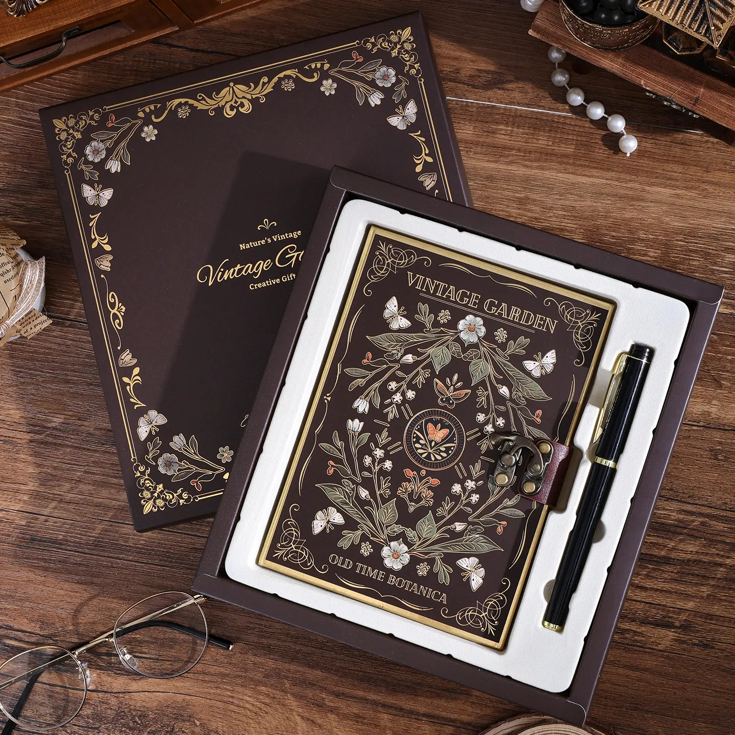 Vintage-Style Journal/Notebook Gift Set — Includes a writing pen; unisex design; available in three styles (notebook size: 5.2 x 7.2 inches); features 80 full-color pages.