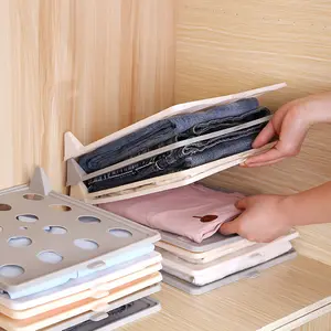 Creative wardrobe storage folding board for home use, foldable plastic shirt long-sleeve anti-wrinkle folding board