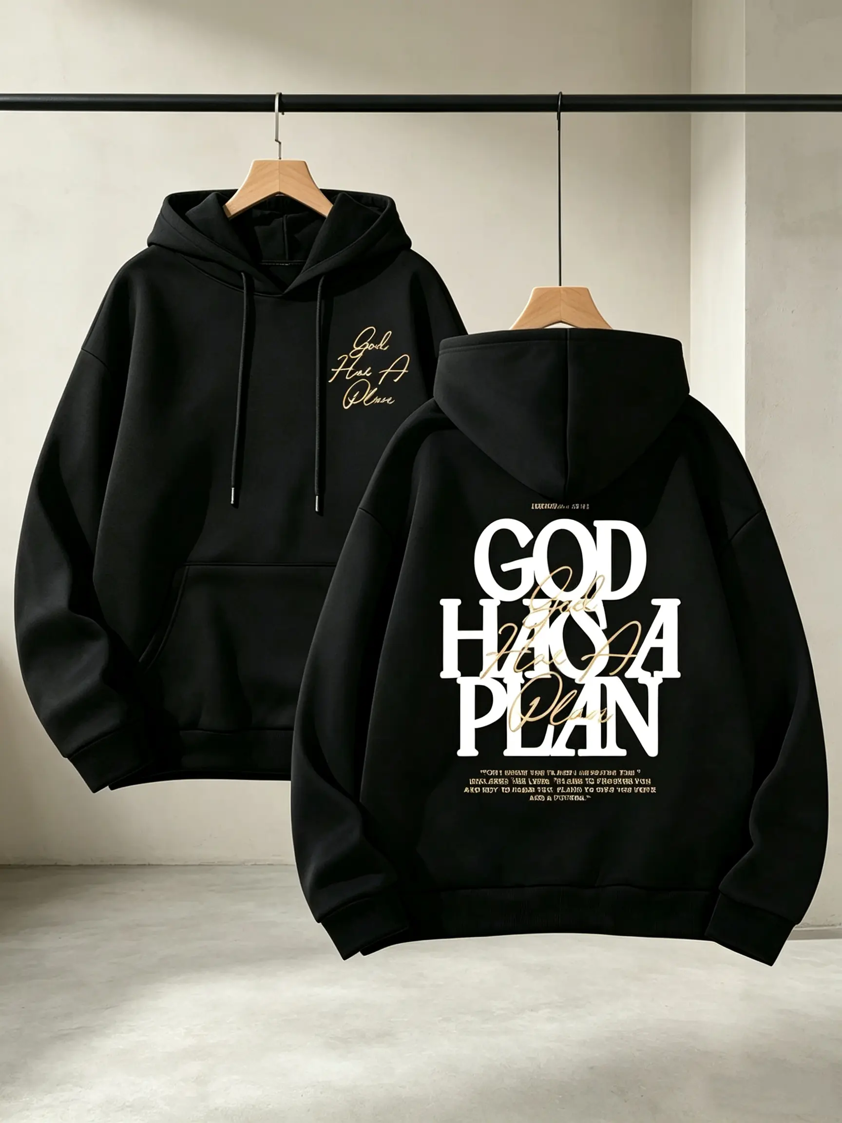 God Has A Plan Front Back Graphic Hoodie, Premium Brushed Fleece Loose Fit Black Pullover Hoodie, Luxury Gold Accent Cursive & Bold Stacked Letter Bible Verse Design, Trendy Inspirational Christian Streetwear For Believers