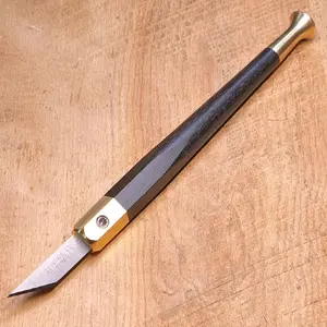 Hex2Round Craft Knife -handcrafted from ebony and brass with on-board magnetic wrench.