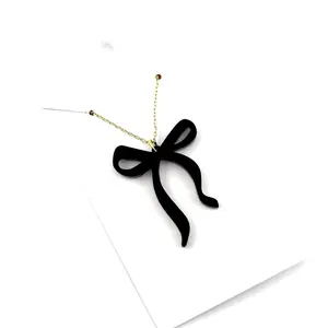 Riveting Ranch Boutique Black Bow Necklace - Elegant Fashion Accessory for Women