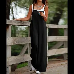 Women Baggy Dungarees Jumpsuit Strappy Wide Leg Playsuit Overalls XL New   This Women Baggy Dungarees Jumpsuit in XL size features a square neckline, sleeveless design, and wide-leg style, making it perfect for a casual and comfortable look. The black ov