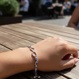 Elegant 925 Silver Infinity Bracelet with Blue evil eye Beads