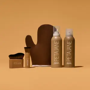 The Pro Bundle - At Home Professional Self Tanning Kit includes tanning mousse, tanning mist, face brush, body brush and tanning mitt.