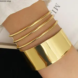 Gold Stackable Bangle Bracelets for Women - Trendy Chunky Wide Cuff + Thin Hoop Set, Shiny Waterproof Stainless Steel Gold Bangles, Perfect for Daily Stacking Layering Party Evening & Elegant Wrist Looks