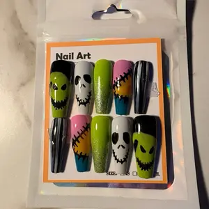 Oggie Boogie Press Nail Art Set with Colorful Skull Designs and Glitter Accents for Halloween