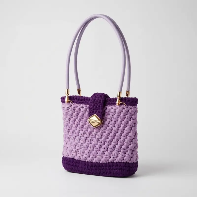 Lavender Crochet Handbag with Gold Accents and Purple Trim Elegant and Stylish Design