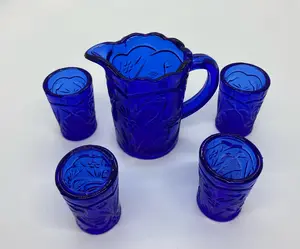 Mini Cobalt Blue Pitcher & 4 Glasses with Embossed Peacock Motif Elegant Drinkware Set for Stylish Entertaining