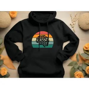 Women's neuroscience and brain-themed apparel Graphic Hoodie - Long Sleeve Pullover Regular Fit | Soft & Breathable Fabric, Durable Print, Everyday Comfort, Machine Washable, retro vintage with colorful gradient sunset design flat lay product photography