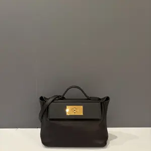 Pre-owned HERMÈS Leather tote bags Hermes 24/24 Mini Volupto 89 Noir (gl011626b1)