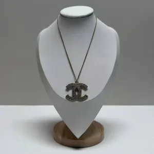 Pre-owned Chanel Gold Brass Crushed Crystals Logo Statement Necklace GIA1002