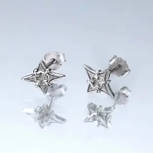 Niche personality four-pointed star cross screw design fashionable earrings