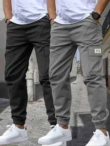 Utility-style solid-color multi-pocket tapered pants made from durable fabric, perfect for streetwear, outdoor activities, and sports. Ideal for men's casual wear.