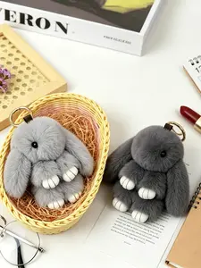 A soft, cute, Fluffy plush lop-eared rabbit keychain charm, suitable for daily wear, vacation dates, and other occasions, and also a delightful and exquisite little gift.