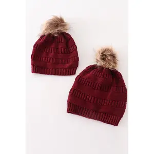 Burgundy pompom cable beanie