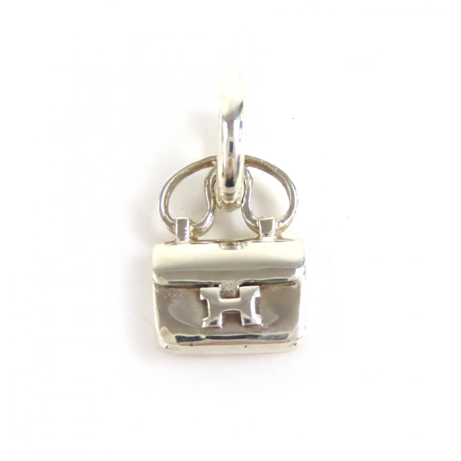 Pre-owned HERMÈS Sterling Silver 925 (Ag925) Small Leather Goods Hermes Constance AG925 Pendant