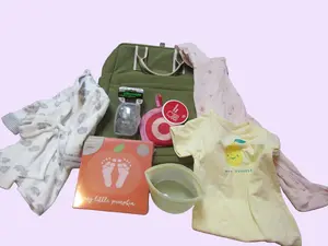 Universal Thread Co Baby Bundle - Includes Diaper Bag, Carter's Footie Pajamas, Cat and Jack Onsie, Robe, Pacifiers, Footprint Keepsake, Snack Pouch & Tote Bag