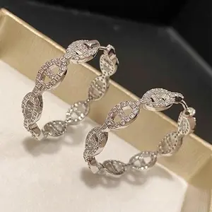 Stella Earrings with Decorative Design and Silver Finish