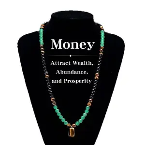 This necklace features natural obsidian paired with green flower stone and square tiger eye pendants. It boasts a simple yet elegant design, with a smooth, polished surface and a lustrous finish.        ？ ？ ？