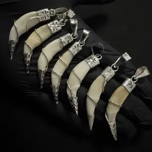 Colmillos de coyote encasquillados en PLATA 925 mexicana