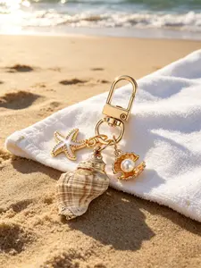 1pc Asymmetrical Shell, Starfish, And Conch Wallet Pendant Decorative Keychain, Nautical Keychain, Ocean Element Conch And Starfish Keyring, Bag Charm For Girls, Vacation Style Accent Piece, Versatile Commuter Decoration, Oceanic Elements, Nautical Theme
