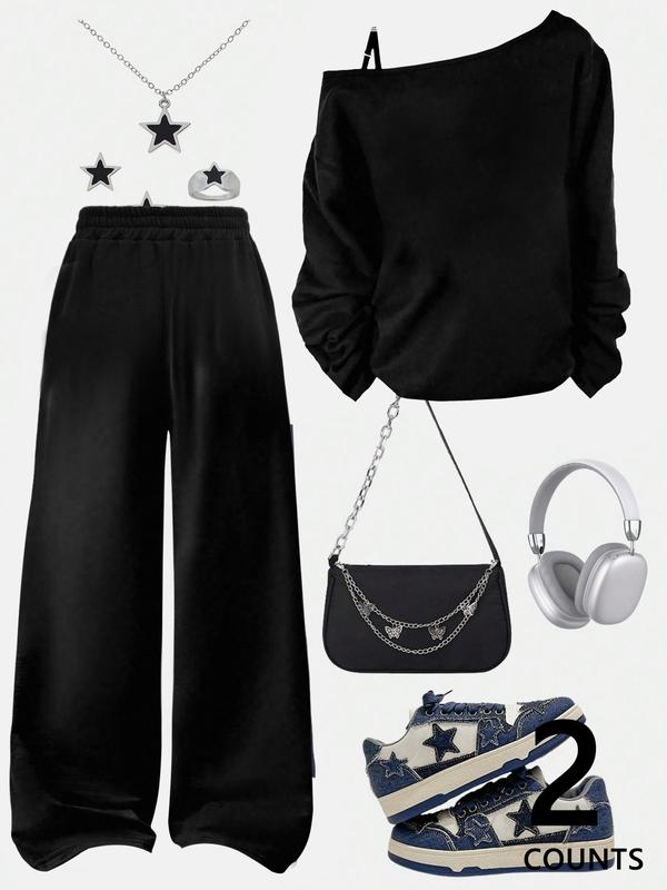 A teenage girl's off-shoulder top and wide-leg casual trousers; a loose-fitting, oversized casual long-sleeved top with a letter print paired with loose-fitting drawstring trousers; soft, suitable for women, and versatile.