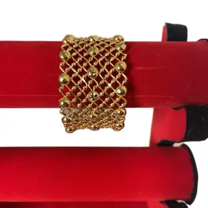 Traditional Gold Plated Jali Design Bangle on Red Velvet Display Box