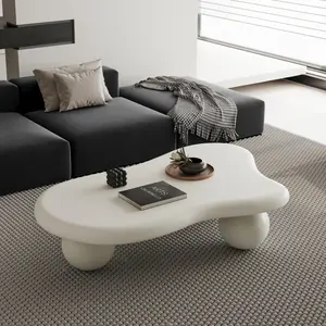 47-inch cloud-shaped coffee table with 3 spherical legs and an elegant irregular tabletop. Durable construction. Kid- and pet-friendly. Suitable for living rooms.